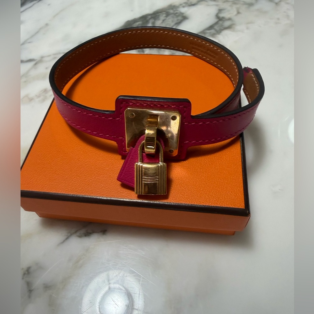 Hermès Pink Leather Bracelet with Gold Padlock